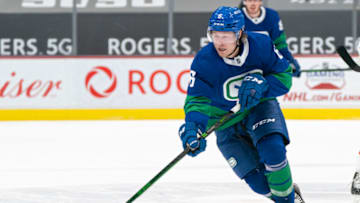 VANCOUVER, BC - APRIL 22: Brock Boeser #6 of the Vancouver Canucks skates with the puck during NHL action against the Ottawa Senators at Rogers Arena on April 22, 2021 in Vancouver, Canada. (Photo by Rich Lam/Getty Images)