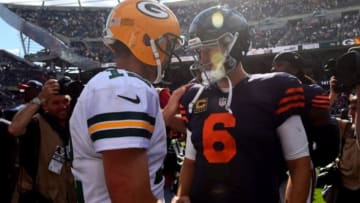 Sep 13, 2015; Chicago, IL, USA; Chicago Bears quarterback Jay Cutler (6) and Green Bay Packers quarterback Aaron Rodgers (12) talk after the game at Soldier Field. Green Bay Packers defeats the Chicago Bears 31-23. Mandatory Credit: Mike DiNovo-USA TODAY Sports