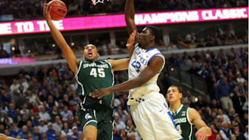 Nov 12, 2013; Chicago, IL, USA; Michigan State Spartans guard Denzel Valentine (45) scores over Kentucky Wildcats forward Alex Poythress (22) during the first half at the United Center. Mandatory Credit: Dennis Wierzbicki-USA TODAY Sports