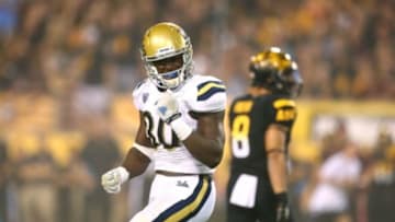 Sep 25, 2014; Tempe, AZ, USA; UCLA Bruins linebacker Myles Jack (30) celebrates a play against the Arizona State Sun Devils at Sun Devil Stadium. UCLA defeated Arizona State 62-27. Mandatory Credit: Mark J. Rebilas-USA TODAY Sports