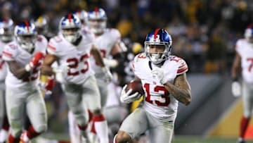 Dec 4, 2016; Pittsburgh, PA, USA; New York Giants wide receiver Odell Beckham Jr. (13) runs the ball against the Pittsburgh Steelers during the second half at Heinz Field. The Steelers won the game, 24-14. Mandatory Credit: Jason Bridge-USA TODAY Sports