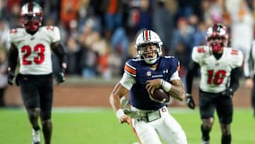 Auburn football quarterback Robby Ashford (9) runs the ball as Auburn Tigers take on Western Kentucky Hilltoppers at Jordan-Hare Stadium in Auburn, Ala., on Saturday, Nov. 19, 2022. Auburn Tigers defeated Western Kentucky Hilltoppers 41-17.