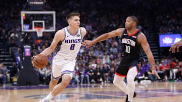 SACRAMENTO, CA - APRIL 02: Bogdan Bogdanovic #8 of the Sacramento Kings drives to the basket against Eric Gordon #10 of the Houston Rockets at Golden 1 Center on April 2, 2019 in Sacramento, California. NOTE TO USER: User expressly acknowledges and agrees that, by downloading and or using this photograph, User is consenting to the terms and conditions of the Getty Images License Agreement. (Photo by Lachlan Cunningham/Getty Images)