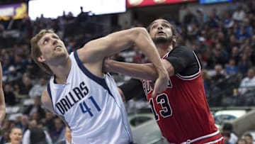 Jan 23, 2015; Dallas, TX, USA; Dallas Mavericks forward Dirk Nowitzki (41) and Chicago Bulls center Joakim Noah (13) fight for position during the first quarter at the American Airlines Center. Mandatory Credit: Jerome Miron-USA TODAY Sports