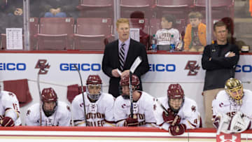 CHESTNUT HILL, MA - OCTOBER 28: Associate Coach Greg Brown of the Boston College Eagles stands behind the bench as he fills-in for head coach Jerry York who is recovering from eye surgery during NCAA hockey against the Providence College Friars at Kelley Rink on October 28, 2016 in Chestnut Hill, Massachusetts. The Eagles won 3-1. (Photo by Richard T Gagnon/Getty Images)