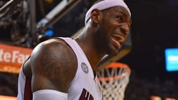Jun 20, 2013; Miami, FL, USA; Miami Heat small forward LeBron James (6) reacts during the second quarter of game seven in the 2013 NBA Finals against the San Antonio Spurs at American Airlines Arena. Mandatory Credit: Steve Mitchell-USA TODAY Sports