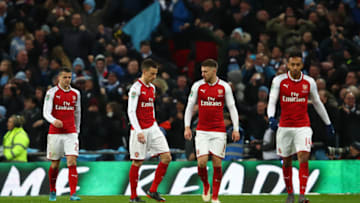 LONDON, ENGLAND - FEBRUARY 25: Granit Xhaka, Laurent Koscielny, Aaron Ramsey and Pierre-Emerick Aubameyang of Arsenal look dejected during the Carabao Cup Final between Arsenal and Manchester City at Wembley Stadium on February 25, 2018 in London, England. (Photo by Julian Finney/Getty Images)
