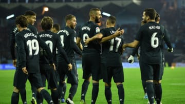 VIGO, SPAIN - NOVEMBER 11: Karim Benzema of Real Madrid celebrate with team mates after scores the second goal during the La Liga match between RC Celta de Vigo and Real Madrid CF at Abanca-Balaidos on November 11, 2018 in Vigo, Spain. (Photo by Octavio Passos/Getty Images)