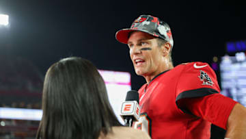 Dec 5, 2022; Tampa, Florida, USA; Tampa Bay Buccaneers quarterback Tom Brady (12) celebrates after beating the New Orleans Saints at Raymond James Stadium. Mandatory Credit: Nathan Ray Seebeck-USA TODAY Sports