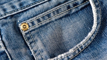 Jeans sometimes have a fake pocket. There are reasons for that, but not they're not necessarily good ones.