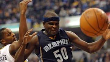 Oct 29, 2015; Indianapolis, IN, USA; Memphis Grizzlies forward Zach Randolph (50) and Indiana Pacers guard C.J. Miles (0) fight for control for the ball in the first half at Bankers Life Fieldhouse. Mandatory Credit: Thomas J. Russo-USA TODAY Sports