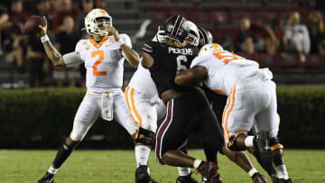 COLUMBIA, SOUTH CAROLINA - SEPTEMBER 26: Quarterback Jarrett Guarantano #2 of the Tennessee Volunteers attempts a pass as defensive lineman Zacch Pickens #6 of the South Carolina Gamecocks pressures him during the football game at Williams-Brice Stadium on September 26, 2020 in Columbia, South Carolina. (Photo by Mike Comer/Getty Images)