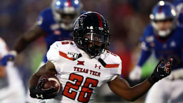 LAWRENCE, KANSAS - OCTOBER 26: Ta'Zhawn Henry #26 of the Texas Tech Red Raiders carries the ball during the game against the Kansas Jayhawks at Memorial Stadium on October 26, 2019 in Lawrence, Kansas. (Photo by Jamie Squire/Getty Images)