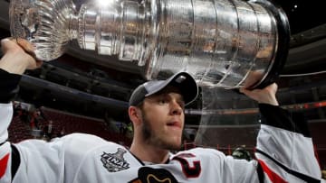 PHILADELPHIA - JUNE 09: Jonathan Toews #19 of the Chicago Blackhawks hoists the Stanley Cup after teammate Patrick Kane scored the game-winning goal in overtime to defeat the Philadelphia Flyers 4-3 and win the Stanley Cup in Game Six of the 2010 NHL Stanley Cup Final at the Wachovia Center on June 9, 2010 in Philadelphia, Pennsylvania. (Photo by Jim McIsaac/Getty Images)