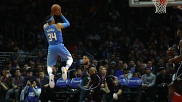 LOS ANGELES, CA - MARCH 10: Tobias Harris #34 of the Los Angeles Clippers shoots a jump shot as D.J. Augustin #14 of the Orlando Magic looks on during the second half of the NBA game between the Orlando Magic and the Los Angeles Clippers at Staples Center on March 10, 2018 in Los Angeles, California. The Clippers defeated the Magic 113-105. NOTE TO USER: User expressly acknowledges and agrees that, by downloading and or using this photograph, User is consenting to the terms and conditions of the Getty Images License Agreement. (Photo by Victor Decolongon/Getty Images)