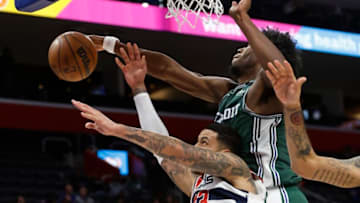DETROIT, MI - MARCH 7: Kyle Kuzma #33 of the Washington Wizards is defended by James Wiseman #13 of the Detroit Pistons (Photo by Duane Burleson/Getty Images)