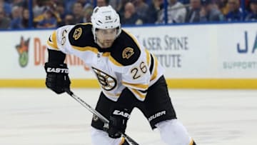 Mar 8, 2016; Tampa, FL, USA; Boston Bruins defenseman John-Michael Liles (26) skates with the puck against the Tampa Bay Lightning during the first period at Amalie Arena. Mandatory Credit: Kim Klement-USA TODAY Sports