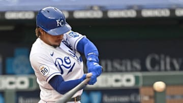 Sep 27, 2020; Kansas City, Missouri, USA; Kansas City Royals shortstop Adalberto Mondesi (27) hits a solo home run during the fourth inning against the Detroit Tigers at Kauffman Stadium. Mandatory Credit: Peter Aiken-USA TODAY Sports