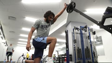 MEMPHIS, TN - MARCH 17: Mike Conley #11 of the Memphis Grizzlies lifts weights before the game on March 17, 2018 at FedExForum in Memphis, Tennessee. NOTE TO USER: User expressly acknowledges and agrees that, by downloading and or using this photograph, User is consenting to the terms and conditions of the Getty Images License Agreement. Mandatory Copyright Notice: Copyright 2018 NBAE (Photo by Joe Murphy/NBAE via Getty Images)