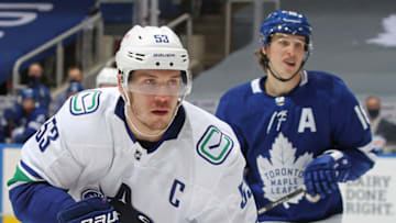 TORONTO,ON - FEBRUARY 8: Bo Horvat #53 of the Vancouver Canucks skates against Mitchell Marner #16 of the Toronto Maple Leafs at Scotiabank Arena on February 8, 2021 in Toronto, Ontario, Canada. The Maple Leafs defeated the Canucks 3-1. (Photo by Claus Andersen/Getty Images)
