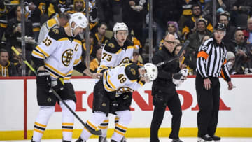 PITTSBURGH, PA - MARCH 10: Boston Bruins Defenseman Matt Grzelcyk (48) skates off the ice with an apparent injury during the second period in the NHL game between the Pittsburgh Penguins and the Boston Bruins on March 10, 2019, at PPG Paints Arena in Pittsburgh, PA. (Photo by Jeanine Leech/Icon Sportswire via Getty Images)