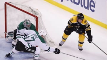 Nov 3, 2015; Boston, MA, USA; Dallas Stars center Devin Shore (17) blocks a pass by Boston Bruins left wing Matt Beleskey (39) during the third period at TD Garden. The Dallas Stars won 5-3. Mandatory Credit: Greg M. Cooper-USA TODAY Sports