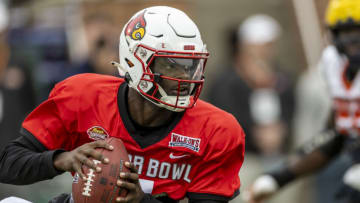 Feb 2, 2023; Mobile, AL, USA; National quarterback Malik Cunningham of Louisville (7) practices during the third day of Senior Bowl week at Hancock Whitney Stadium in Mobile. Mandatory Credit: Vasha Hunt-USA TODAY Sports