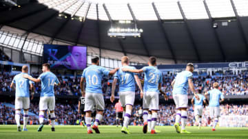 MANCHESTER, ENGLAND - AUGUST 31: Kevin De Bruyne of Manchester City celebrates with teammates after scoring his team's first goal during the Premier League match between Manchester City and Brighton & Hove Albion at Etihad Stadium on August 31, 2019 in Manchester, United Kingdom. (Photo by Laurence Griffiths/Getty Images)