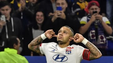 Lyon's Dutch forward Memphis Depay celebrates (Photo by PHILIPPE DESMAZES/AFP via Getty Images)