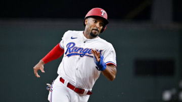 Jun 3, 2023; Arlington, Texas, USA; Texas Rangers second baseman Marcus Semien (2) scores against the Seattle Mariners during the second inning at Globe Life Field. Mandatory Credit: Jerome Miron-USA TODAY Sports