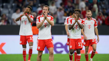 Bayern Munich players applauding fans after defeating Manchester United on Wednesday. (Photo by Matthias Hangst/Getty Images)