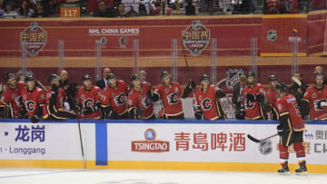 SHENZHEN, CHN - SEPTEMBER 15: Mark Giordano #5 of the Calgary Flames celebrates a goal against the Boston Bruins at the Universiade Sports Center on September 15, 2018 in Shenzhen, China. (Photo by Brian Babineau/NHLI via Getty Images)