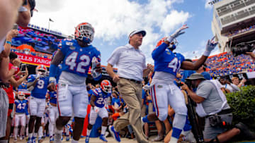 GAINESVILLE, FL- SEPTEMBER 21: Head coach Dan Mullen of the Florida Gators takes the field with his players prior to the start of the game against the Tennessee Volunteers at Ben Hill Griffin Stadium on September 21, 2019 in Gainesville, Florida. (Photo by Carmen Mandato/Getty Images)