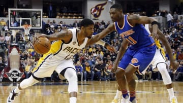 Apr 12, 2016; Indianapolis, IN, USA; Indiana Pacers forward Paul George (13) drives to the basket against New York Knicks forward Cleanthony Early (11) at Bankers Life Fieldhouse. Mandatory Credit: Brian Spurlock-USA TODAY Sports