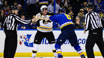 ST. LOUIS, MO - JANUARY 10: Boston Bruins Right Wing David Backes (42) and St. Louis Blues Defenseman Joel Edmundson (6) exchange blows during the second period of an NHL hockey game between the Boston Bruins and the St. Louis Blues on January 10, 2017, at Scottrade Center in St. Louis, MO. (Photo by Tim Spyers/Icon Sportswire via Getty Images)