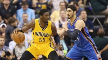 Apr 12, 2015; Indianapolis, IN, USA; Indiana Pacers center Roy Hibbert (55) posts up against Oklahoma City Thunder center Enes Kanter (34) at Bankers Life Fieldhouse. Mandatory Credit: Brian Spurlock-USA TODAY Sports