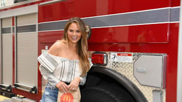 HOBOKEN, NJ - JULY 25: Chrissy Teigen shares McDelivery with the Hoboken Fire Department on July 25, 2017 in Hoboken City. (Photo by Dave Kotinsky/Getty Images for McDonald's)