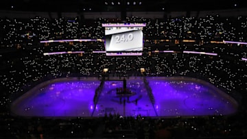 ANAHEIM, CALIFORNIA - JANUARY 29: Fans participate in a 24 second silence to honor the memory of Kobe Bryant prior to a game between the Anaheim Ducks and the Arizona Coyotes at Honda Center on January 29, 2020 in Anaheim, California. (Photo by Sean M. Haffey/Getty Images)