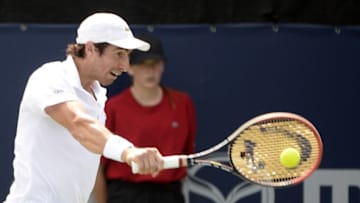 Aug 10, 2015; Montreal, Quebec, Canada; Pablo Cuevas of Uruguay hits the ball against Thomaz Bellucci of Brazil (not pictured) during the Rogers Cup tennis tournament at Uniprix Stadium. Mandatory Credit: Eric Bolte-USA TODAY Sports
