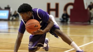 Nov 26, 2013; Blacksburg, VA, USA; Furman Paladins guard Stephen Croone (14) recovers from falling with the ball during the first half against the Virginia Tech Hokies at Cassell Coliseum. Mandatory Credit: Peter Casey-USA TODAY Sports