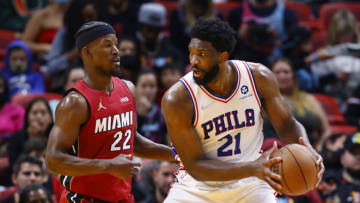 Joel Embiid #21 of the Philadelphia 76ers is defended by Jimmy Butler #22 of the Miami Heat(Photo by Michael Reaves/Getty Images)