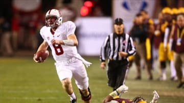 Dec 7, 2013; Tempe, AZ, USA; Stanford Cardinal quarterback Kevin Hogan (8) runs the ball in the second quarter against the Arizona State Sun Devils at Sun Devil Stadium. Mandatory Credit: Mark J. Rebilas-USA TODAY Sports