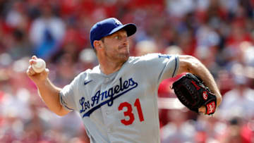 Sep 18, 2021; Cincinnati, Ohio, USA; Los Angeles Dodgers starting pitcher Max Scherzer (31) throws a pitch against the Cincinnati Reds during the first inning at Great American Ball Park. Mandatory Credit: David Kohl-USA TODAY Sports