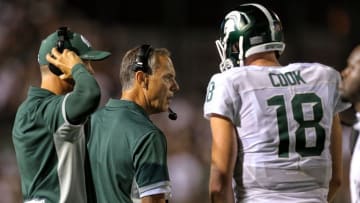 Sep 4, 2015; Kalamazoo, MI, USA; Michigan State Spartans head coach Mark Dantonio talks to quarterback Connor Cook (18) during the 2nd half of a game at Waldo Stadium. Mandatory Credit: Mike Carter-USA TODAY Sports