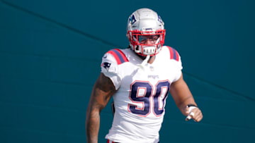 MIAMI GARDENS, FLORIDA - DECEMBER 20: Shilique Calhoun #90 of the New England Patriots takes the field prior to the game against the Miami Dolphins at Hard Rock Stadium on December 20, 2020 in Miami Gardens, Florida. (Photo by Mark Brown/Getty Images)