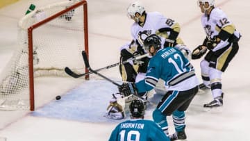 Dec 1, 2015; San Jose, CA, USA; San Jose Sharks center Patrick Marleau (12) scores against the San Jose Sharks in the second period at SAP Center at San Jose. Mandatory Credit: John Hefti-USA TODAY Sports.