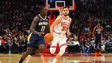 Jrue Holiday #11 of the New Orleans Pelicans handles the ball during a preseason game against the Chicago Bulls (Photo by Stacy Revere/Getty Images)