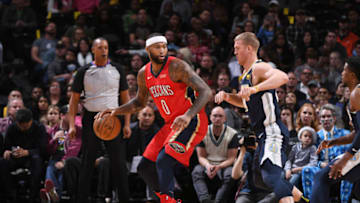 DENVER, CO - DECEMBER 15: DeMarcus Cousins #0 of the New Orleans Pelicans handles the ball against Mason Plumlee #24 of the Denver Nuggets on December 15, 2017 at the Pepsi Center in Denver, Colorado. NOTE TO USER: User expressly acknowledges and agrees that, by downloading and/or using this Photograph, user is consenting to the terms and conditions of the Getty Images License Agreement. Mandatory Copyright Notice: Copyright 2017 NBAE (Photo by Garrett Ellwood/NBAE via Getty Images)