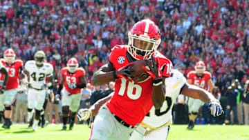ATHENS, GA - NOVEMBER 26: Isaiah McKenzie #16 of the Georgia Bulldogs makes a catch for a touchdown against Lawrence Austin #20 of the Georgia Tech Yellow Jackets at Sanford Stadium on November 26, 2016 in Athens, Georgia. (Photo by Scott Cunningham/Getty Images)