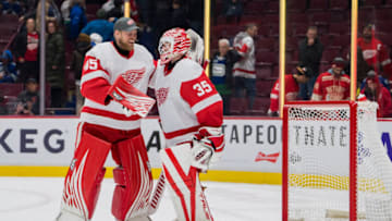 Feb 13, 2023; Vancouver, British Columbia, CAN; Detroit Red Wings goalie Magnus Hellberg (45) and goalie Ville Husso (35) celebrate the victory over the Vancouver Canucks at Rogers Arena. Red Wings won 6-1. Mandatory Credit: Bob Frid-USA TODAY Sports